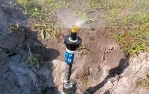 image of water sprinkler attached with a well