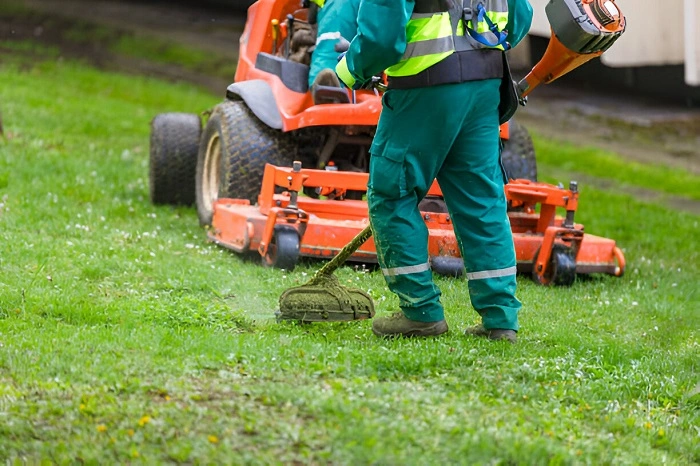 image of mowing lawn