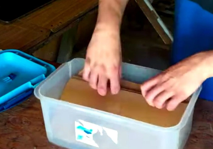 image of adding substrate in the plastic bed