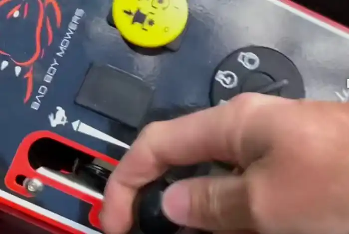 image of throttle of bad boy zero turn mower setting on start position