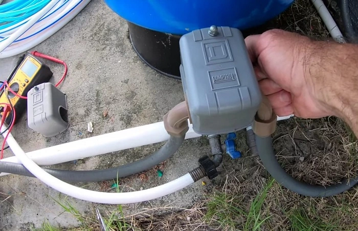 image of replacing a new cover for a well pressure switch